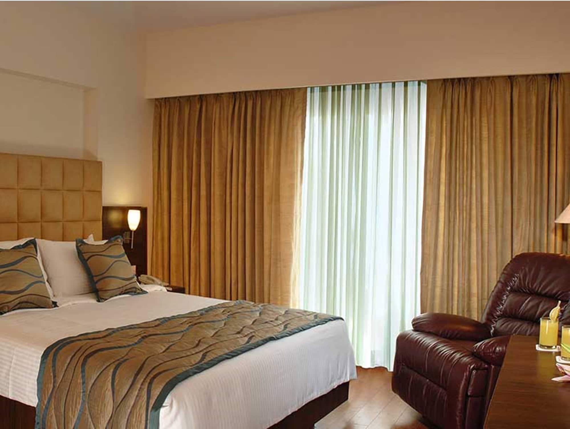 Trinity Hotel Bengaluru Экстерьер фото