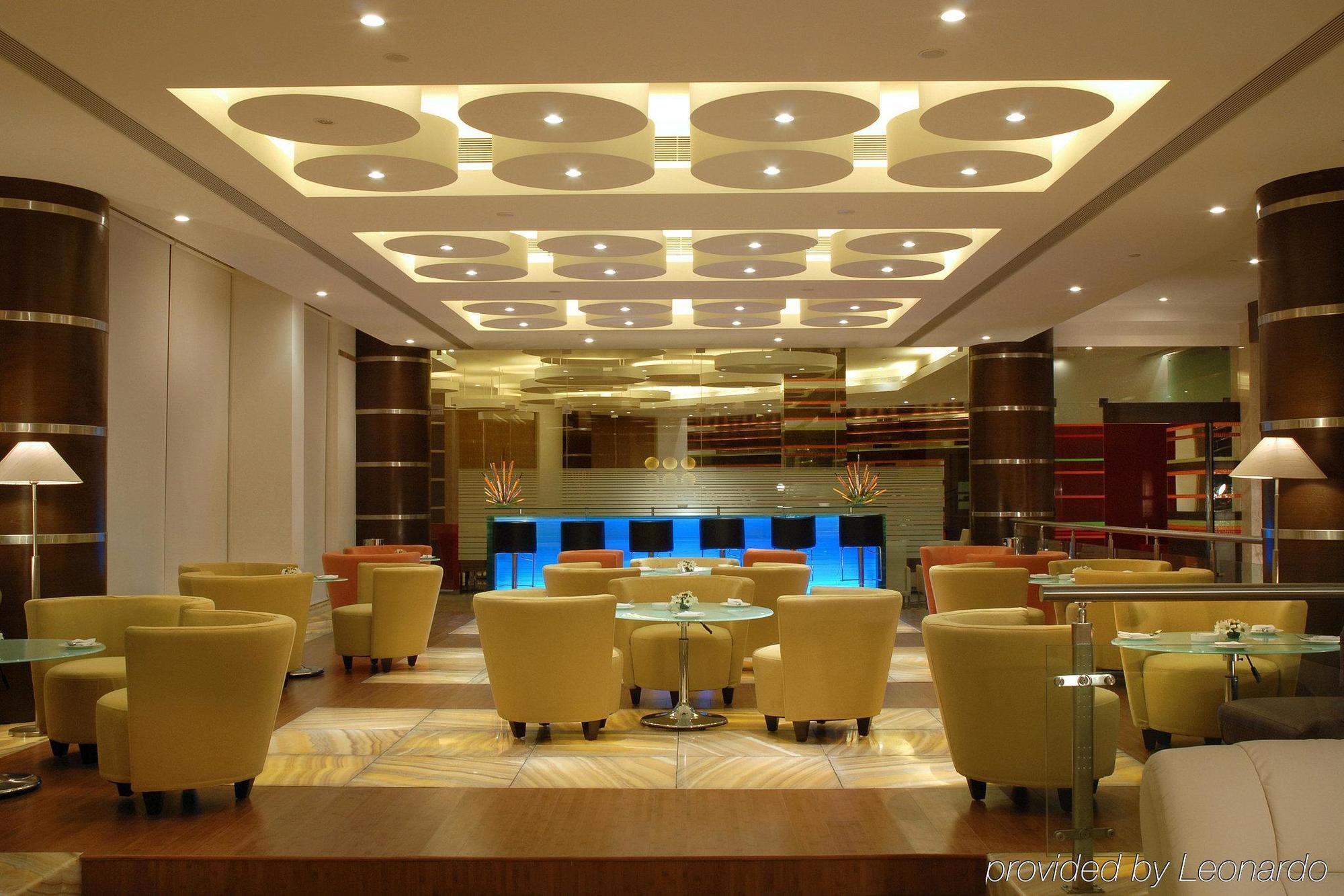 Trinity Hotel Bengaluru Интерьер фото