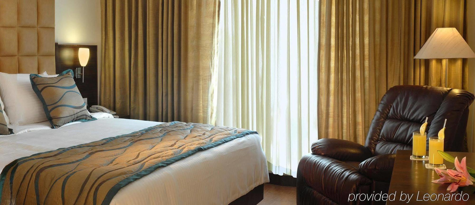 Trinity Hotel Bengaluru Экстерьер фото